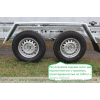 Two-axle boat trailer for transporting boats up to 7.8 m