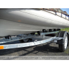 Trailer for transporting rubber RIB boats up to 3.8 m with roller bunks