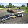 Trailer for transporting rubber RIB boats up to 3.8 m with roller bunks