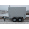 Trailer for transporting generators with a high awning