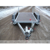 Trailer for transporting generators with a high awning