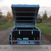 Flatbed trailer with cover