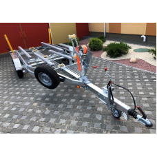 Two-axle trailer for transporting boats up to 5.7 m