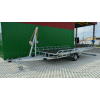 Trailer-platform rotary hydraulic for the transportation of air sleds